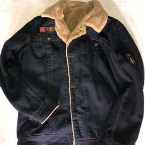 Black jean jacket with brown fur inside